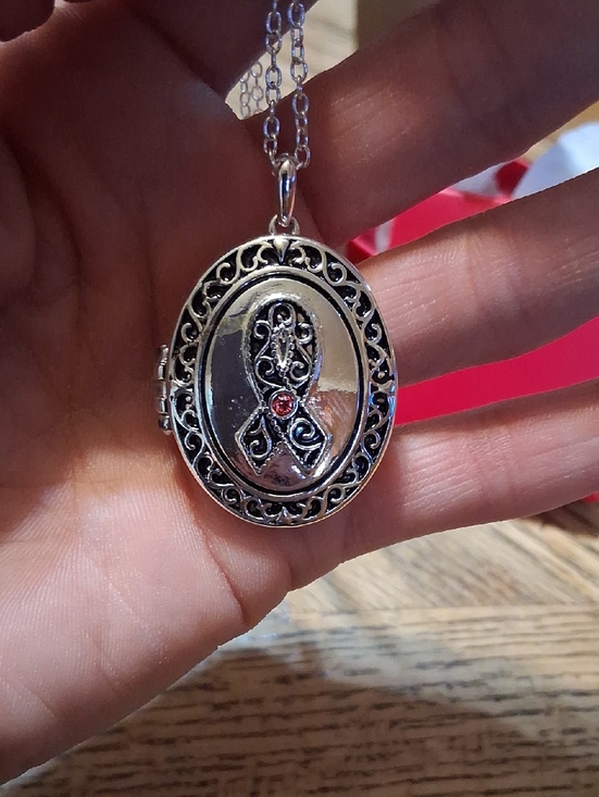 Avon Jewelry - AVON Breast Cancer Awareness Locket Necklace